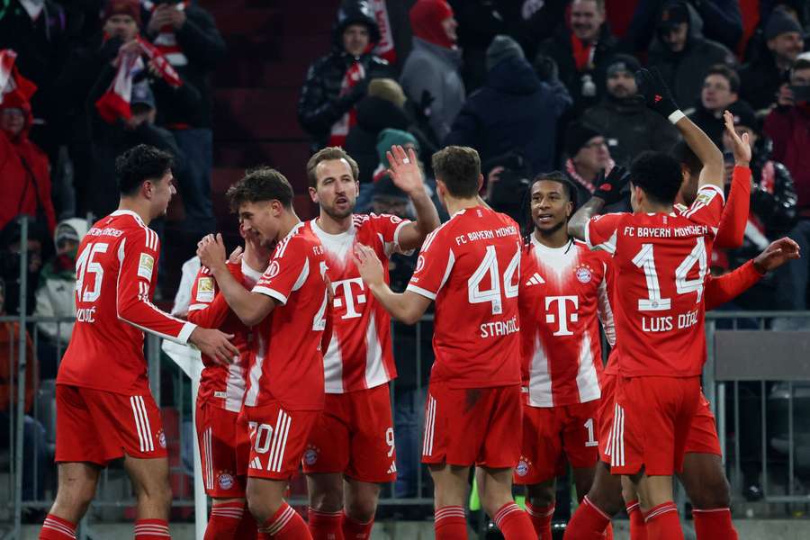 Bayern Munich's players celebrate a goal against Freiburg