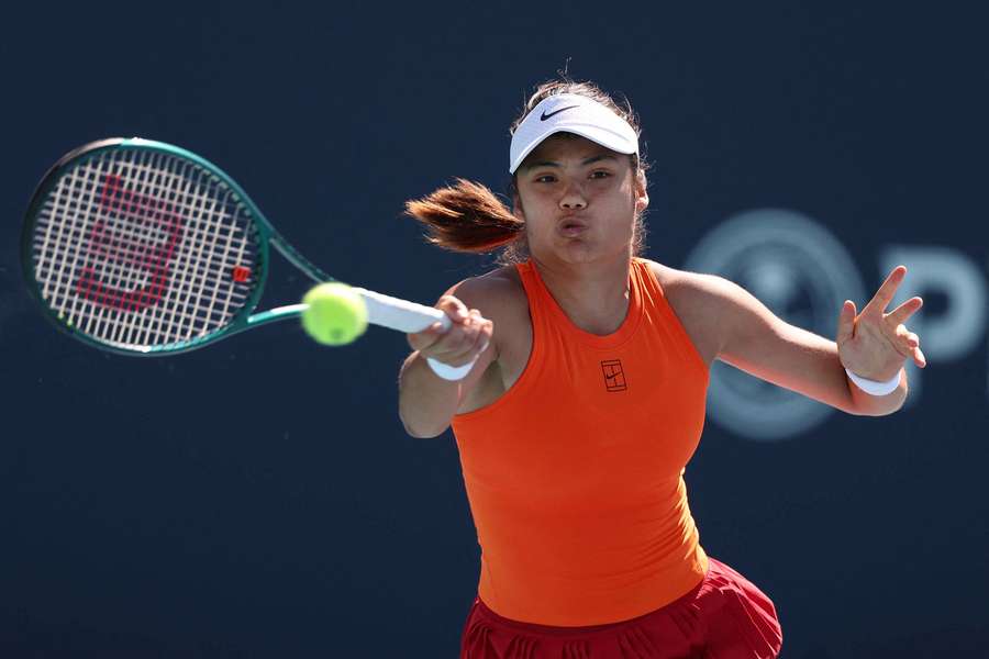 Emma Raducanu returns a shot against Emma Navarro at the Miami Open on Friday