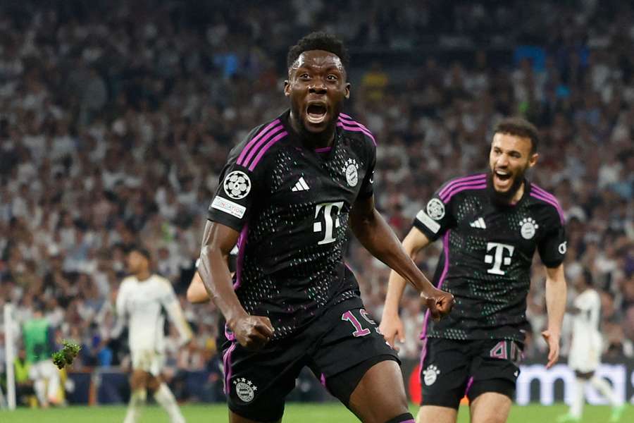 Alphonso Davies celebrates after scoring for Bayern Munich