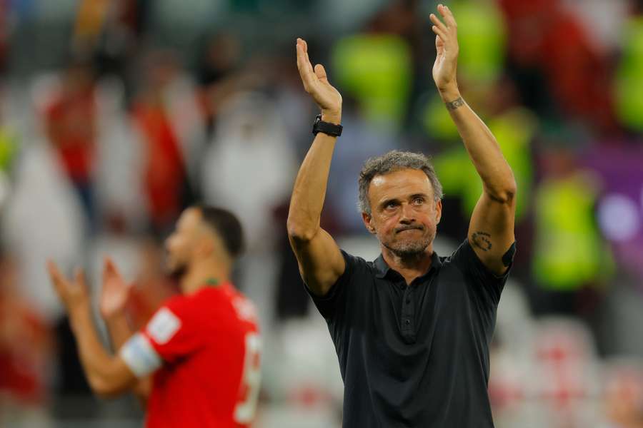 Luis Enrique applauds supporters after Spain lost to Morocco on penalties in the last 16.