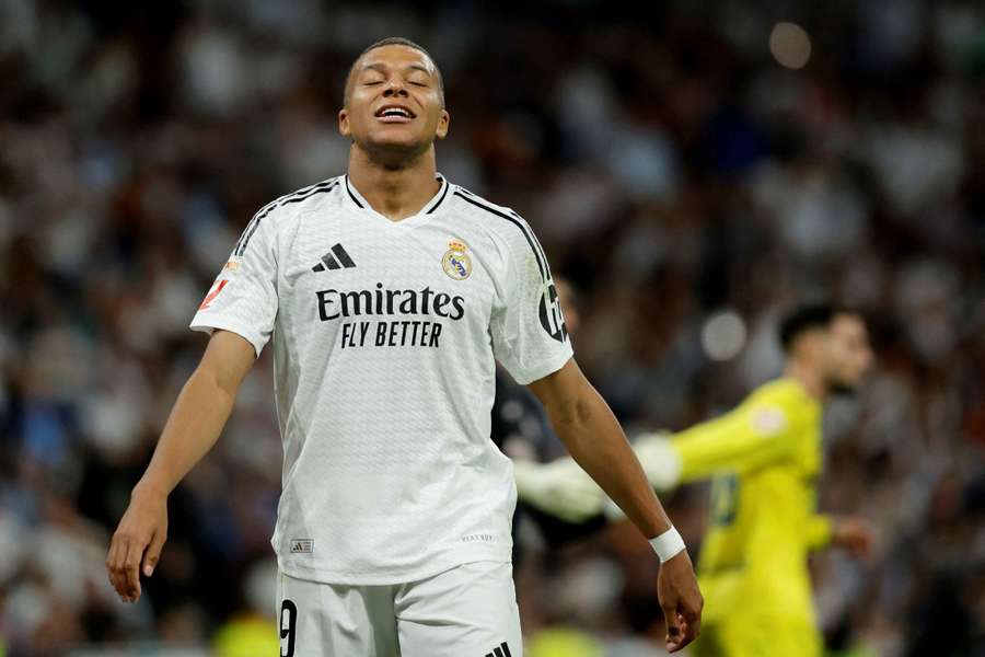 Real Madrid's French forward #09 Kylian Mbappe reacts during the Spanish league football match against Villarreal 