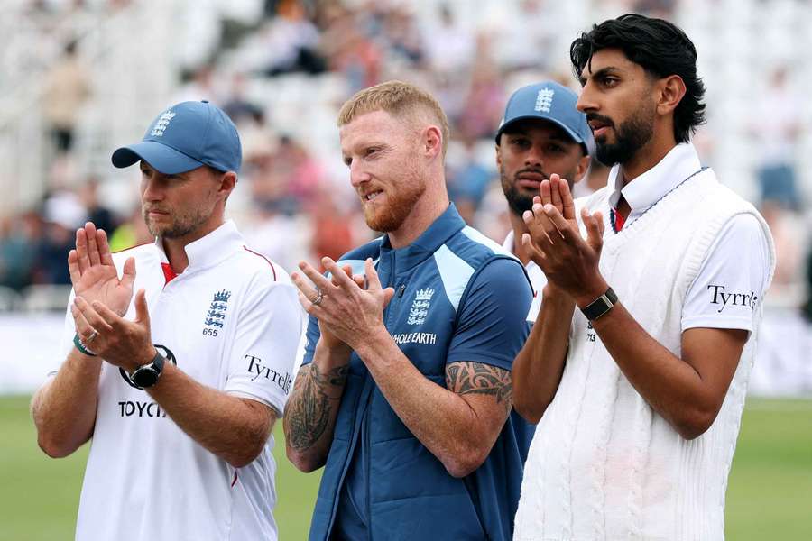 England's Ben Stokes reacts with Joe Root and Shoaib Bashir during the post-match presentation ceremony England's Ben Stokes reacts with Joe Root and Shoaib Bashir during the post-match presentation ceremony