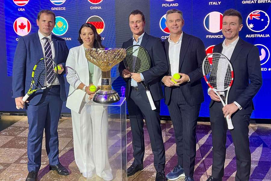 Stephen Farrow, Casey Dellacqua, Lleyton Hewitt, Todd Woodbridge and Paul Daly pose with the trophy at the United Cup draw