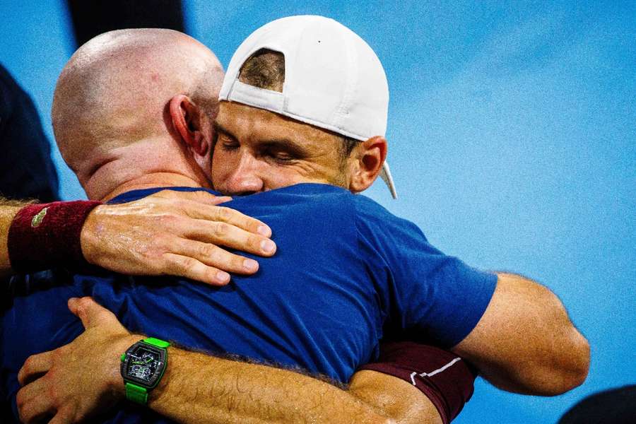 Dimitrov and Delgado embrace after the Brisbane final