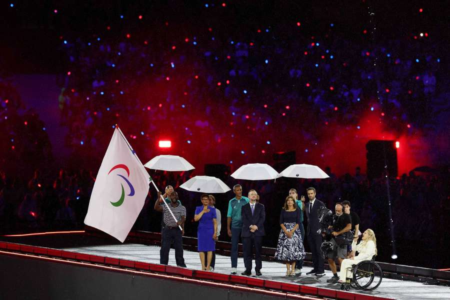 The Paralympic flag is waved during the closing ceremony