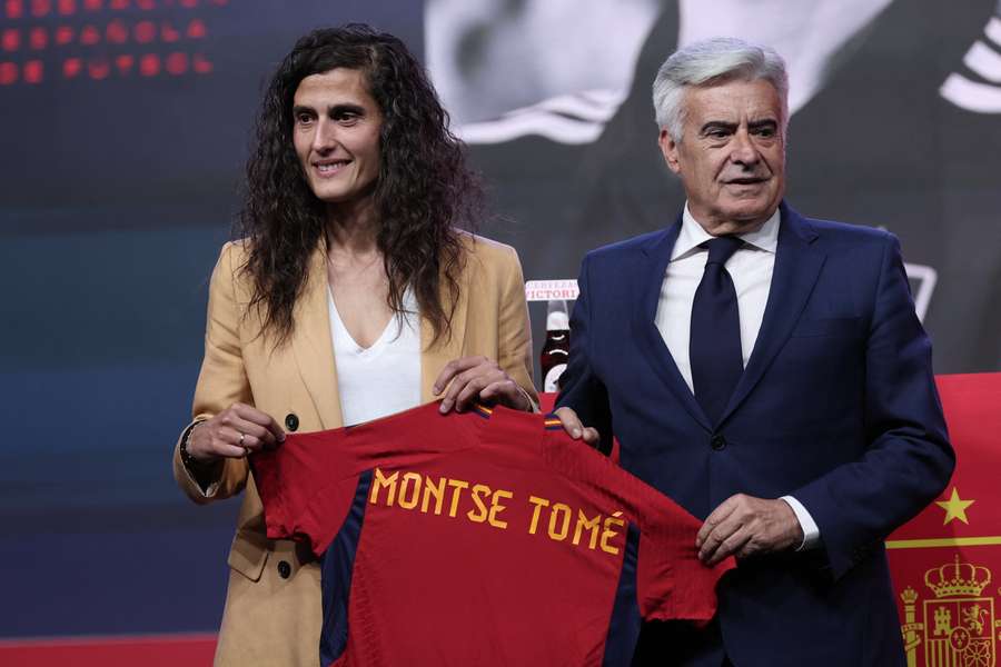New coach of Spain's female football team Montse Tome (L) flanked by Spanish football federation (RFEF) acting president Pedro Rocha