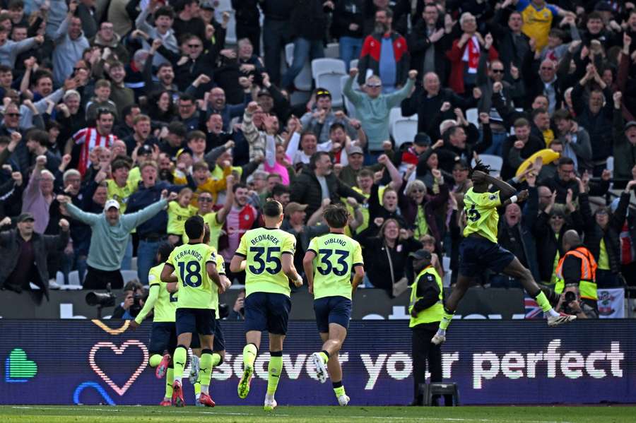 Lesley Ugochukwu celebrates after scoring Southampton's late equaliser at the London Stadium