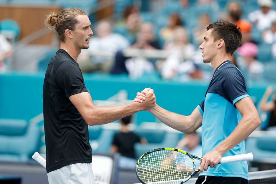 Alex Zverev and Fabian Marozsan shake hands after the game