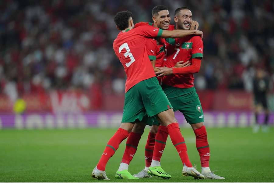 Achraf Hakimi celebrates with his Morocco teammates