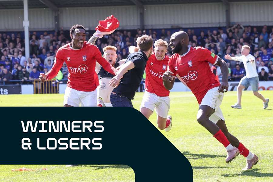 York City players celebrate their last-gasp winner