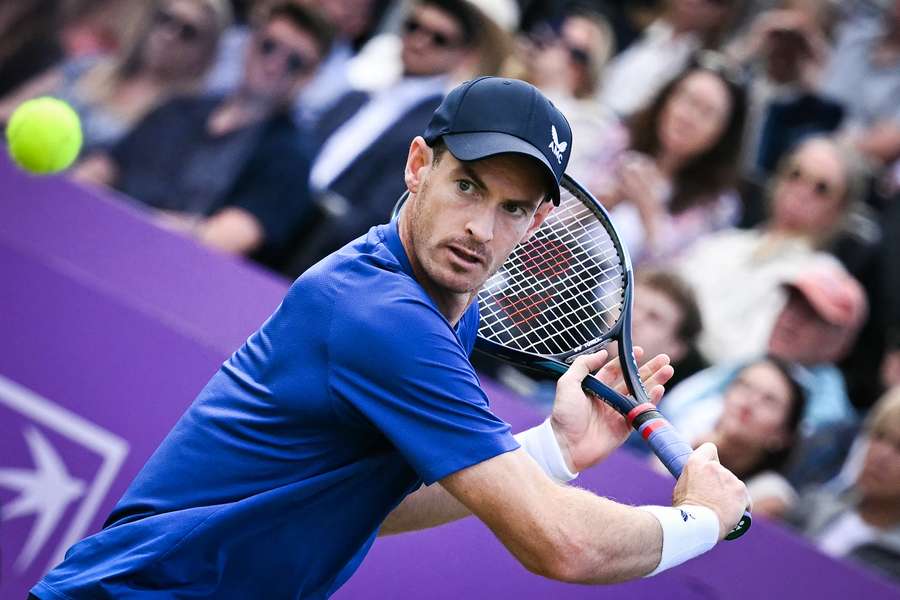 Britain's Andy Murray returns against Australia's Jordan Thompson