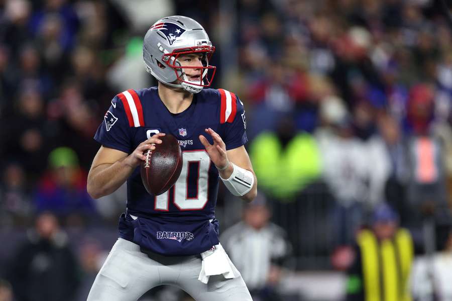 Patriots QB Drake Maye drops back for a pass in 2026 Wild Card matchup Patriots QB Drake Maye drops back for a pass in 2026 Wild Card matchup