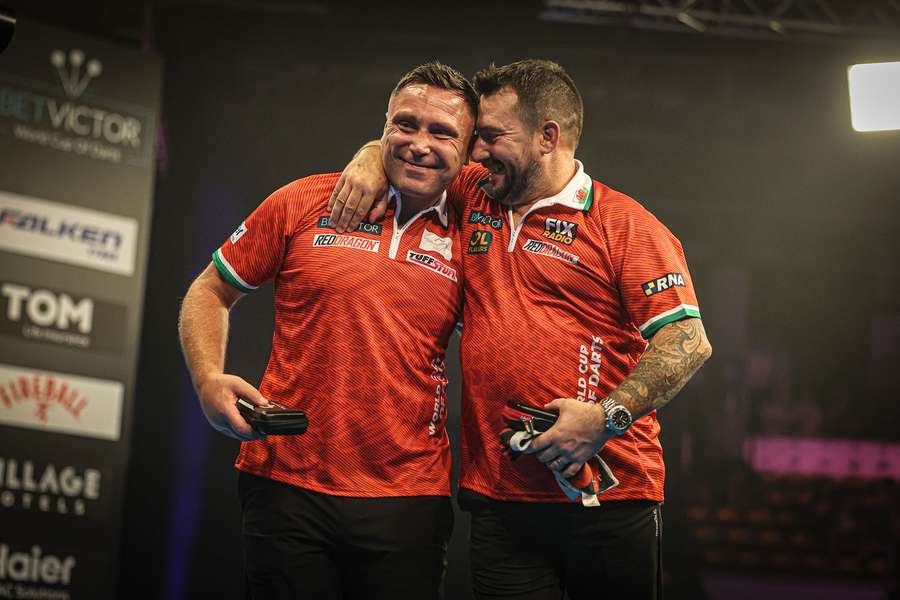 Wales' Gerwyn Price and Jonny Clayton celebrate