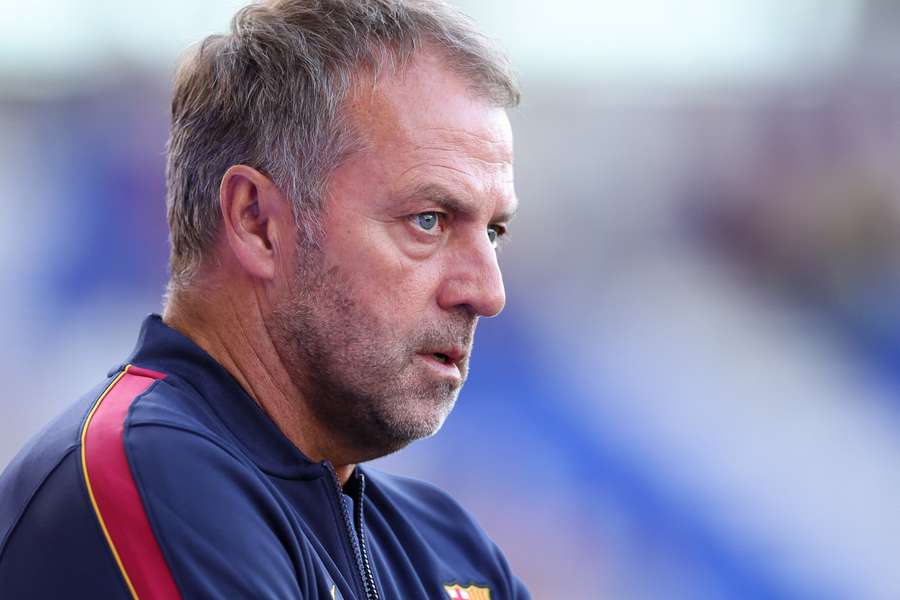 Hansi Flick looks on prior to Barcelona's pre-season friendly against Birmingham Hansi Flick looks on prior to Barcelona's pre-season friendly against Birmingham