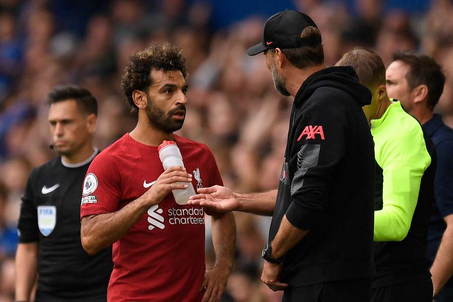 Klopp (right) in discussion with Salah during a Premier League match in 2022 Klopp (right) in discussion with Salah during a Premier League match in 2022