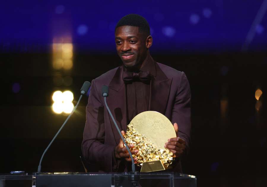 Ousmane Dembele picks up the award