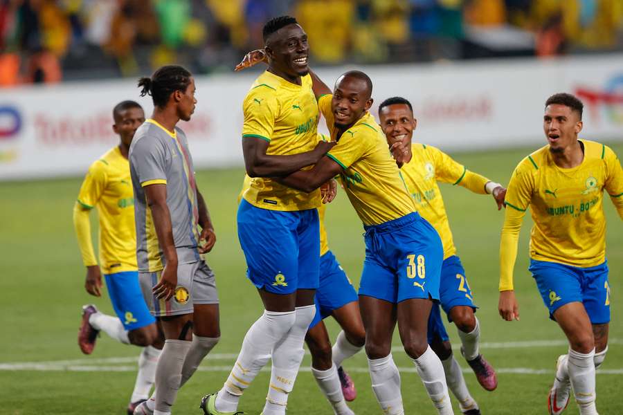 Brian Onyango Mandela, centre, celebrates with teammates
