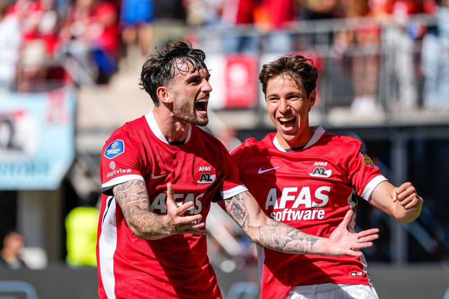 AZ striker Troy Parrott (L) celebrates scoring the 4-1 against FC Groningen with left-back Mateo Chavez