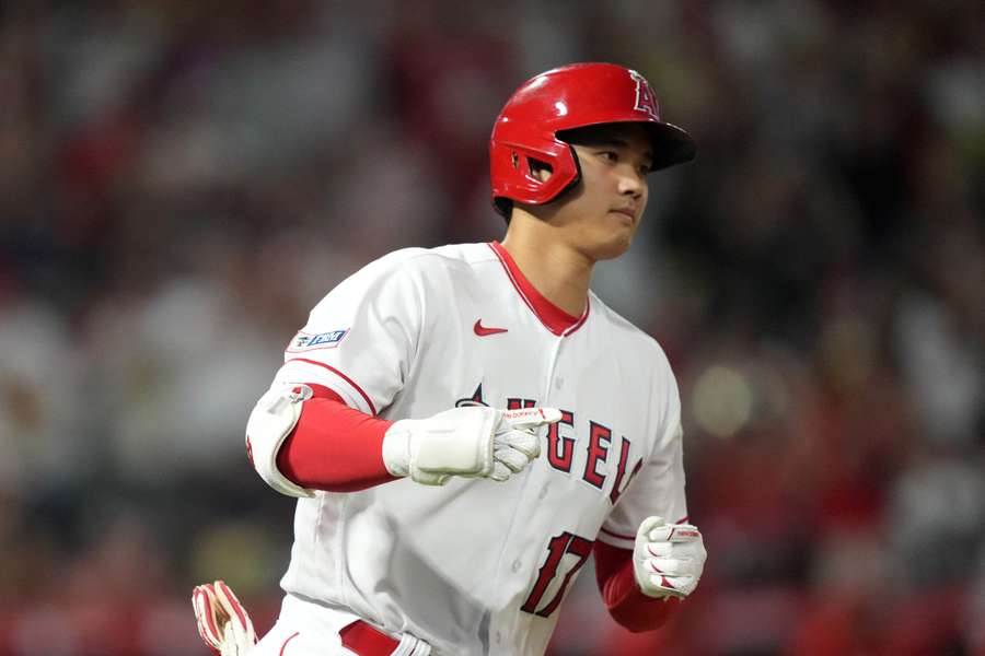 Ohtani rounds the bases after hitting a home run in the sixth inning against the Arizona Diamondbacks