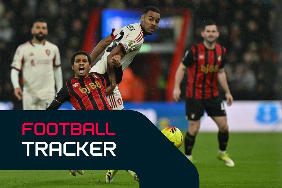 Liverpool and Bournemouth battle for possession