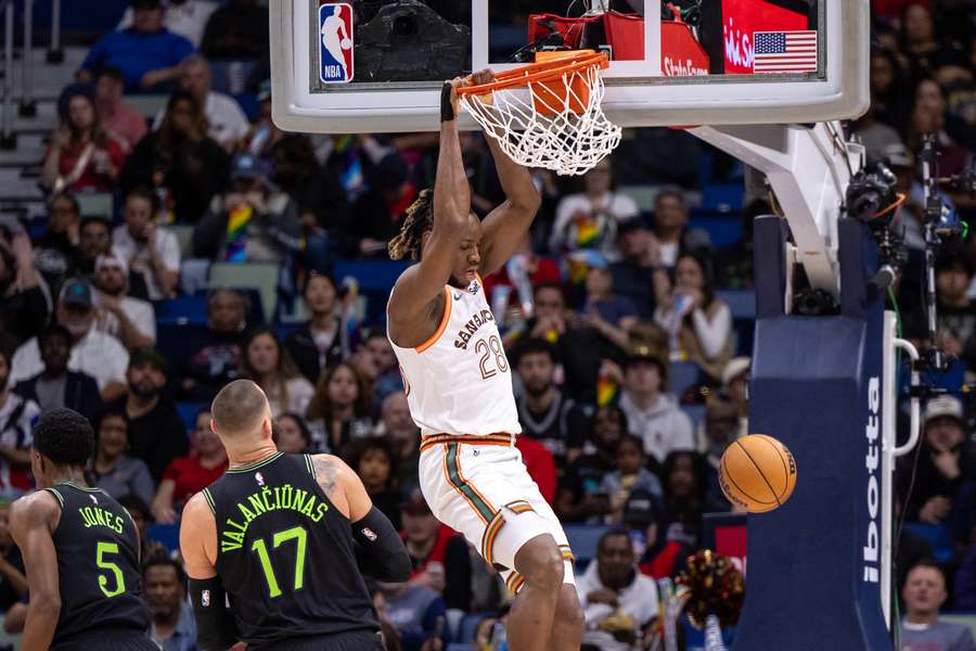 San Antonio Spurs centre Charles Bassey dunks the ball against the New Orleans Pelicans