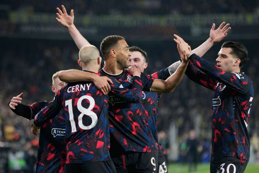 Vaclav Cerny celebrates with teammates after scoring Rangers' third goal in Istanbul