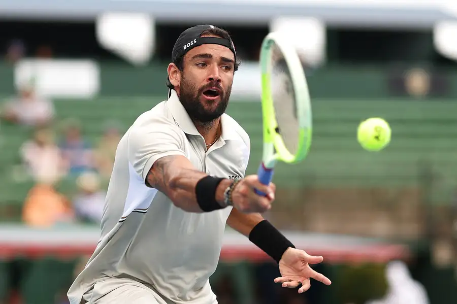 Matteo Berrettini returns a serve at a Kooyong warm-up exhibition on Thursday.