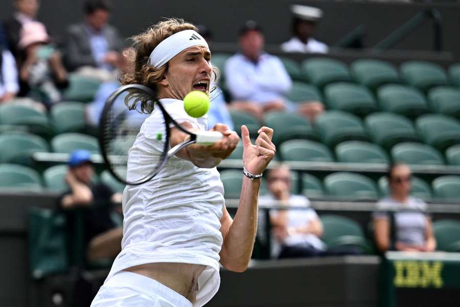 Alexander Zverev powers a forehand back on court