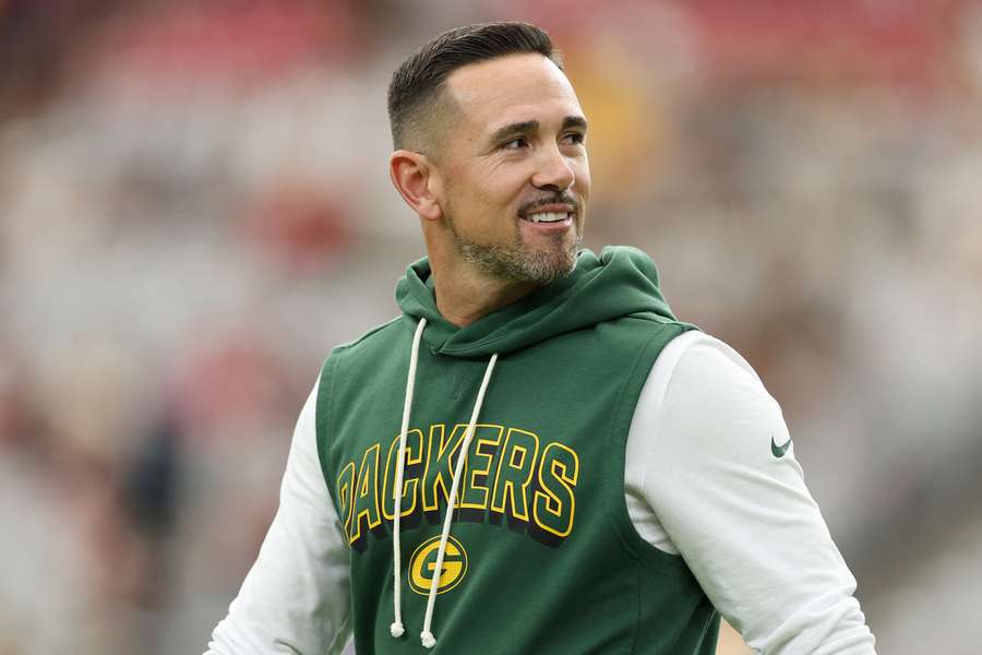 Green Bay Packers head coach Matt LaFleur smiling before a game