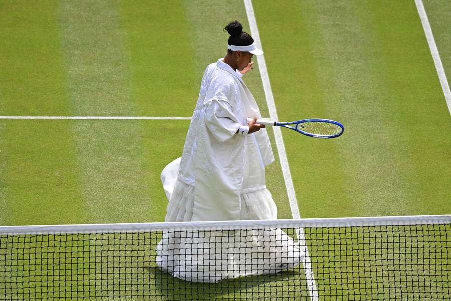 Naomi Osaka enters the court before her match against Daria Kasatkina Naomi Osaka enters the court before her match against Daria Kasatkina