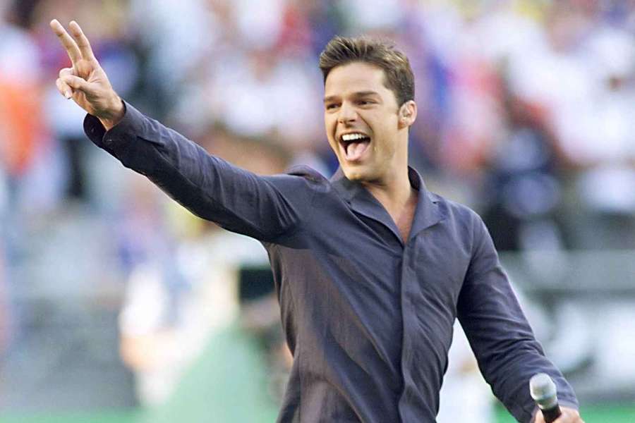 Porto Rican singer Ricky Martin performs 12 July 1998 on the pitch of the Stade de France Porto Rican singer Ricky Martin performs 12 July 1998 on the pitch of the Stade de France