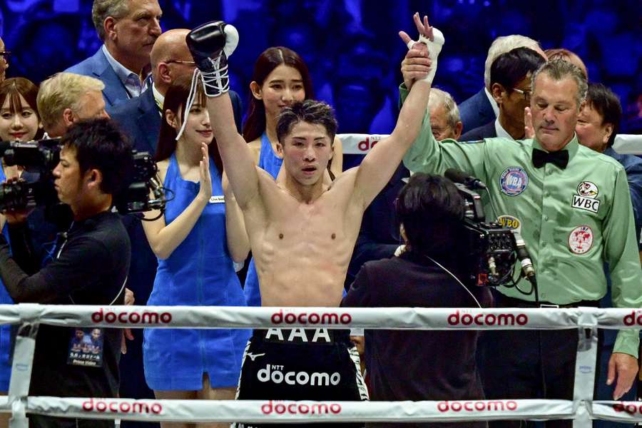 Naoya Inoue celebrates his victory over Luis Nery in their IBF-WBA-WBC-WBO super-bantamweight title fight at the Tokyo Dome