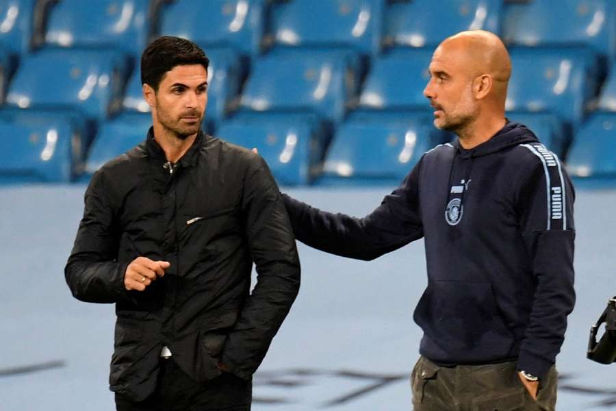 Manchester City manager Pep Guardiola and Arsenal manager Mikel Arteta after the match