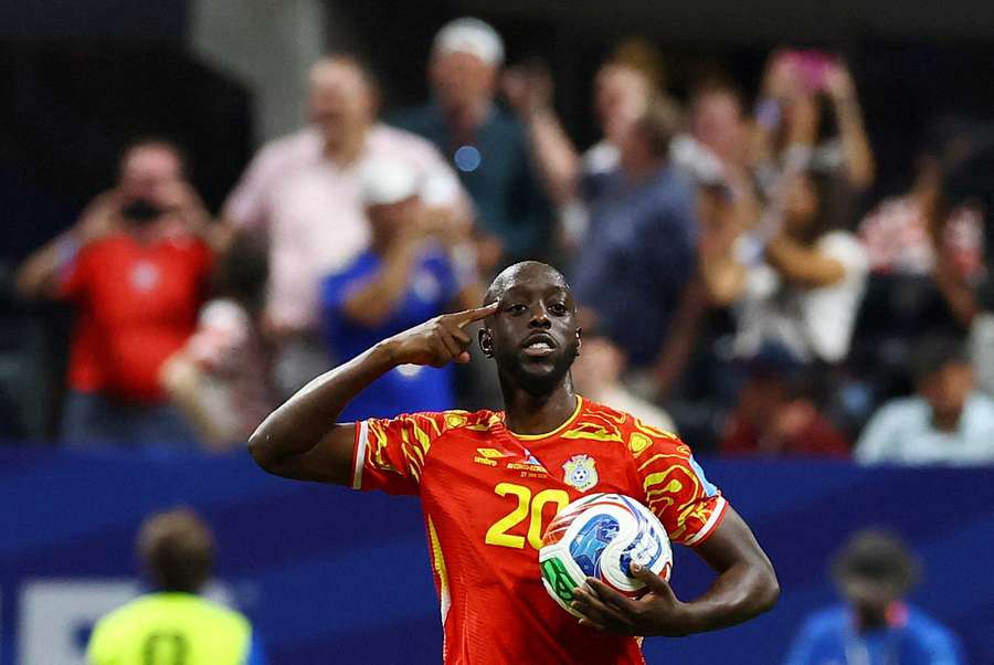 Wissa celebrates scoring for DR Congo