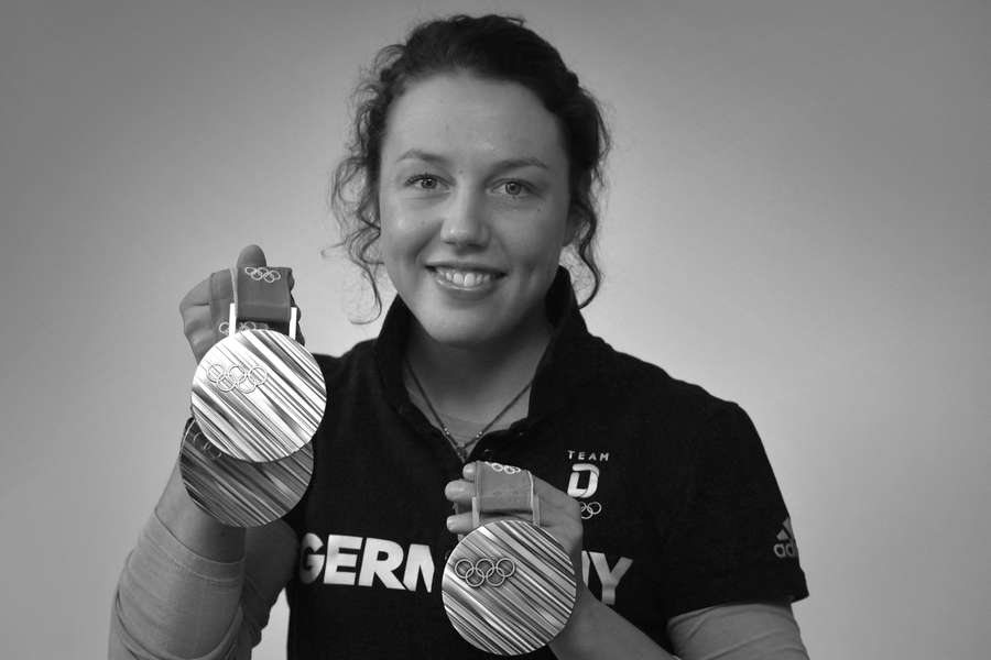 Double Olympic champion Laura Dahlmeier with her medals won at the 2018 Winter Olympics in PyeongChang