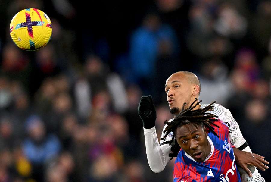 Liverpool's Brazilian midfielder Fabinho vies with Crystal Palace's English midfielder Eberechi Eze