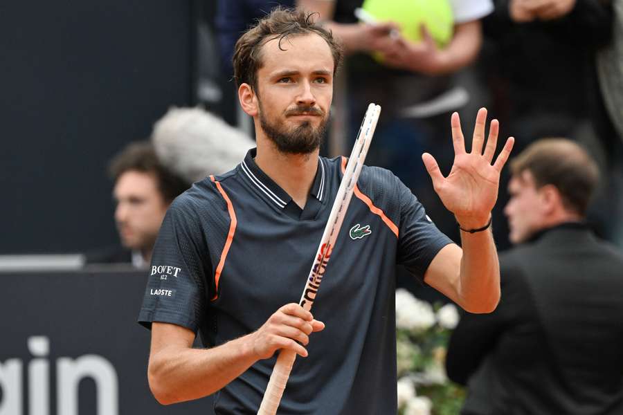 Medvedev waves to the crowd after his win