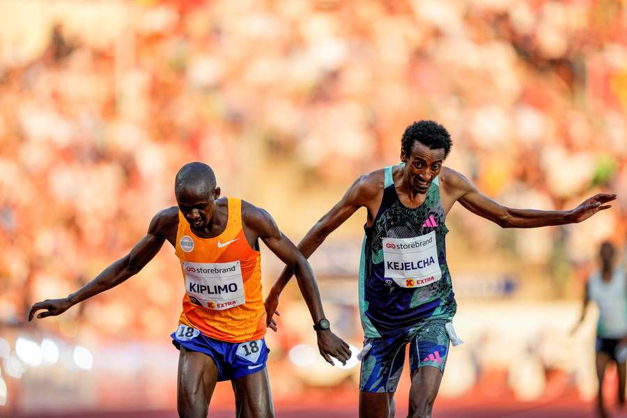 Yomif Kejelcha of Ethiopia wins the men's 5000m ahead of Jacob Kiplimo of Uganda