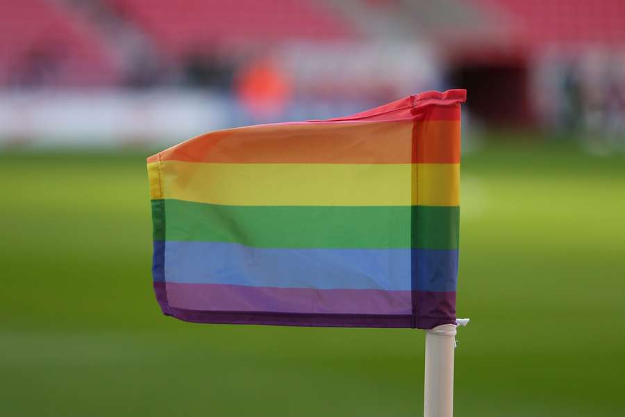 The LGBT flag flying in a Premier League stadium