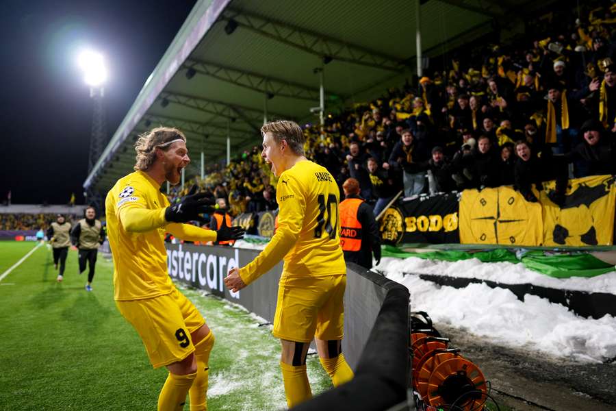 Jens Petter Hauge of Bodo/Glimt celebrates scoring his team's second goal with teammate Kasper Hogh
