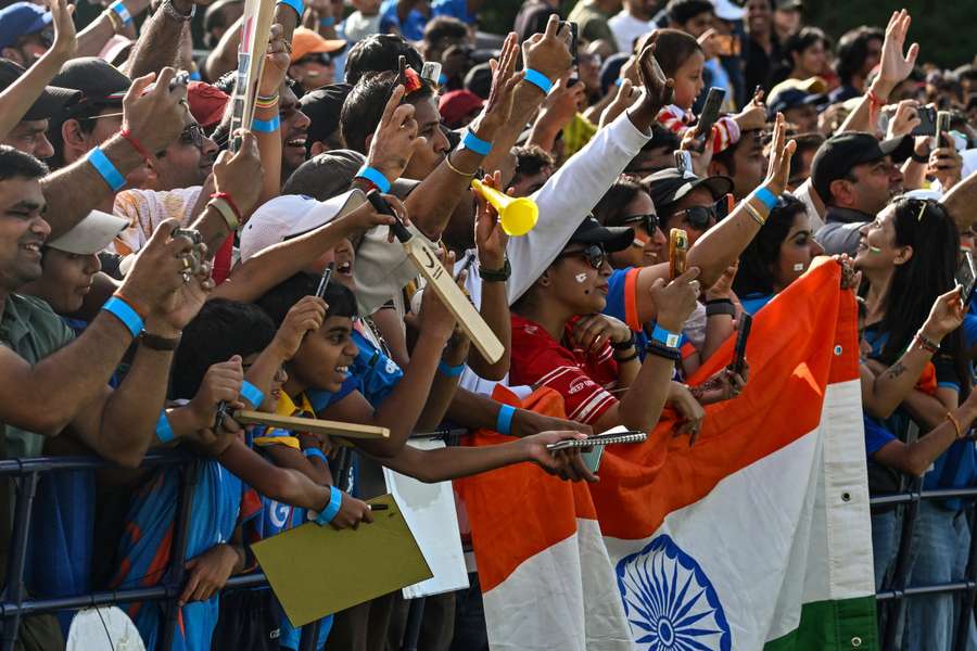 Indian expats packed a sold out Sano International Cricket Stadium and waited for a three-hour delay to see their heroes Indian expats packed a sold out Sano International Cricket Stadium and waited for a three-hour delay to see their heroes