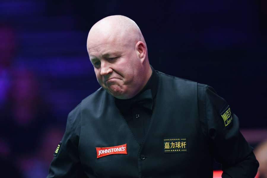 John Higgins during the round one match against Barry Hawkins