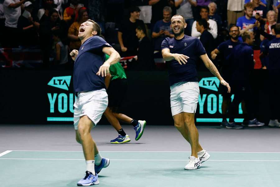 Evans and Skupski celebrate after winning their doubles match