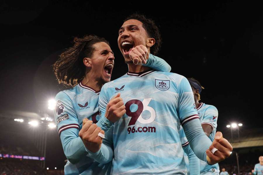 Burnley's Bashir Humphreys and Hannibal Mejbri celebrate their third goal