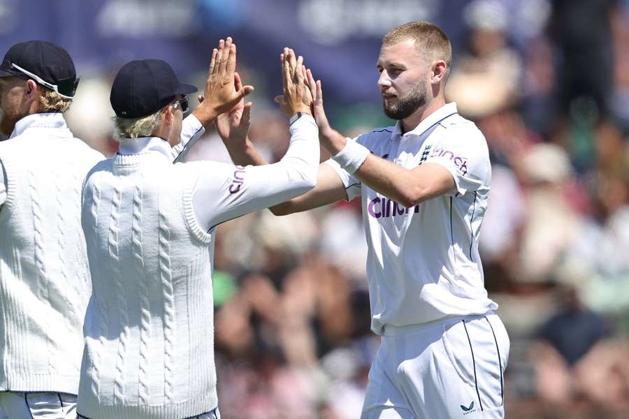England's Gus Atkinson celebrates the wicket of New Zealand's Nathan Smith