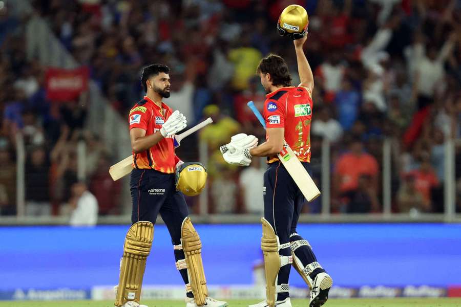Shreyas Iyer and Marcus Stoinis celebrate after the game