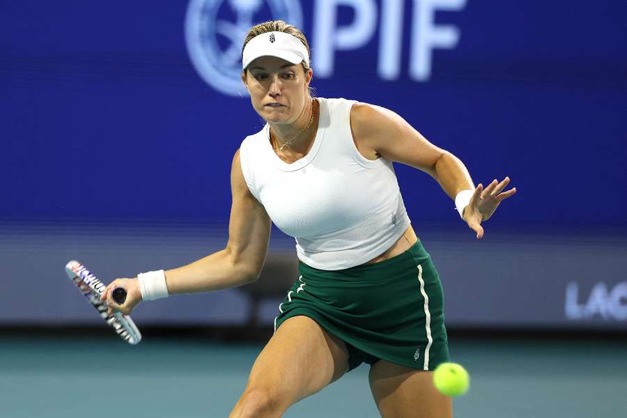 Danielle Collins returns a shot against Ekaterina Alexandrova in their Miami Open semi-final on Thursday