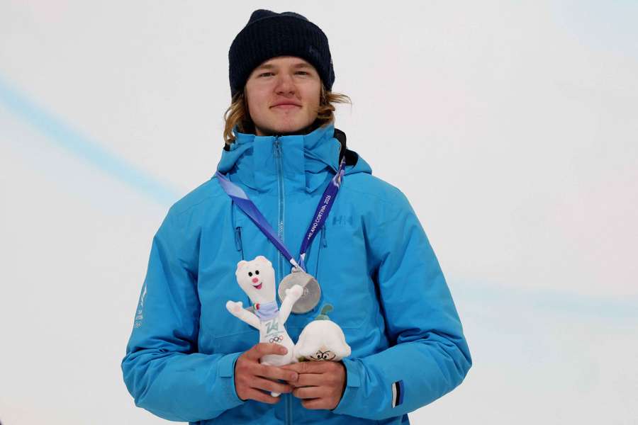 Estonia's Henry Sildaru poses with silver medal at 2026 Winter Olympics
