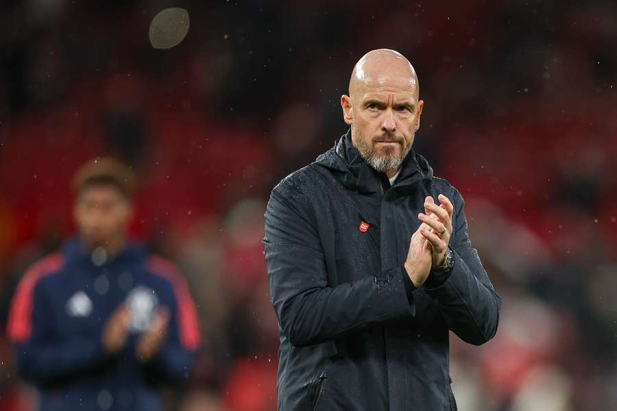 Ten Hag looks on at a stormy Old Trafford