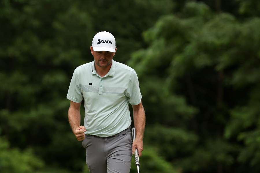 Bradley celebrates following a hole at the Travelers Championship